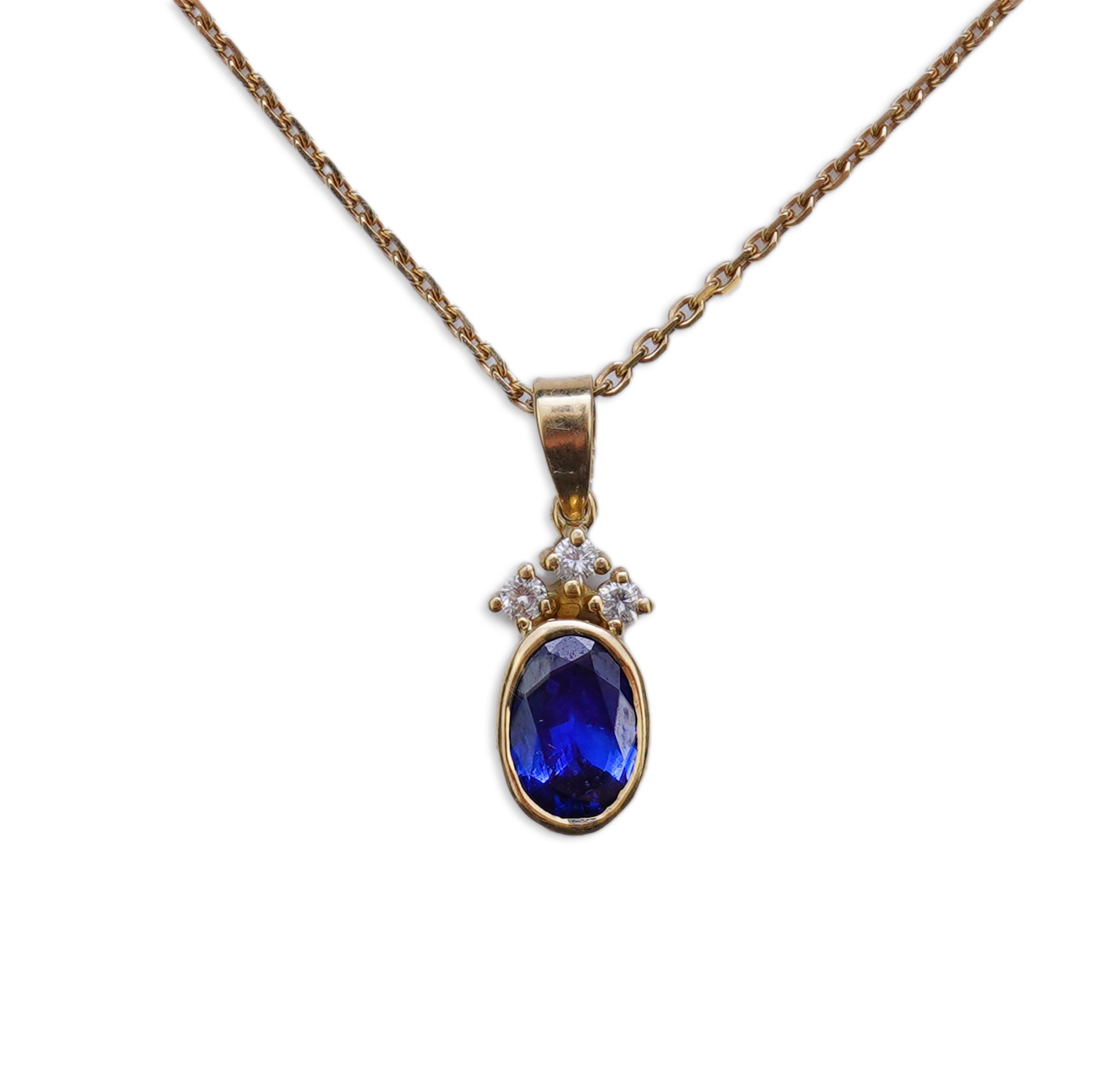 A sapphire and diamond pendant